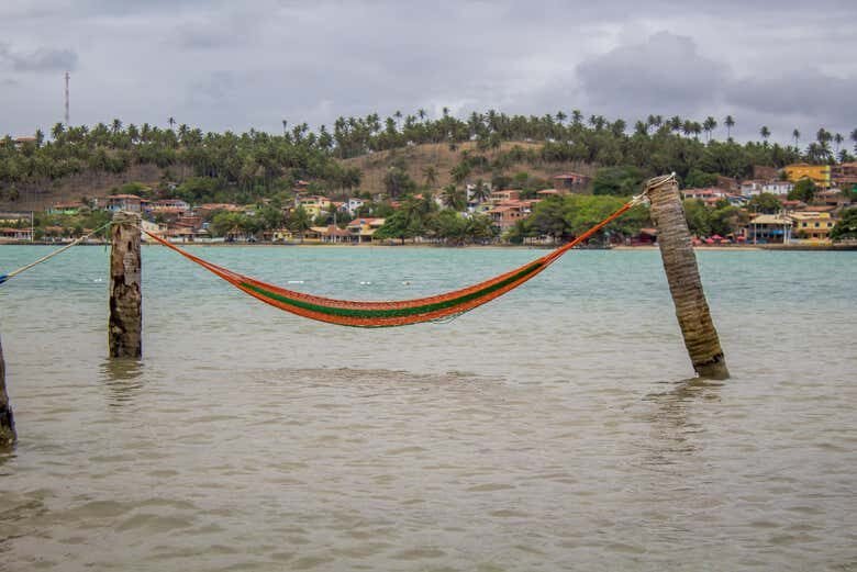 Paraíso Tropical em Barra do Cunhaú: Praias, Rio e Passeio de Barco!
